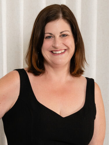 Headshot profile photo of Emma Greco