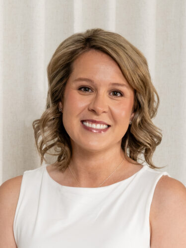 Headshot profile photo of Emma Brown