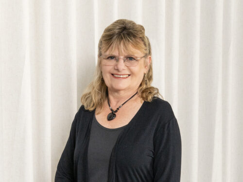 Headshot profile photo of Tina Julien