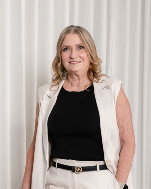 Headshot profile photo of Melanie Hodder