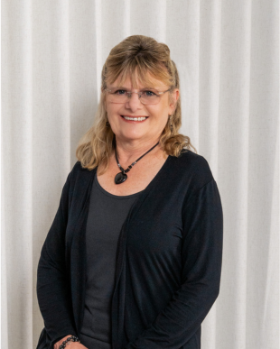 Headshot profile photo of Tina Julien